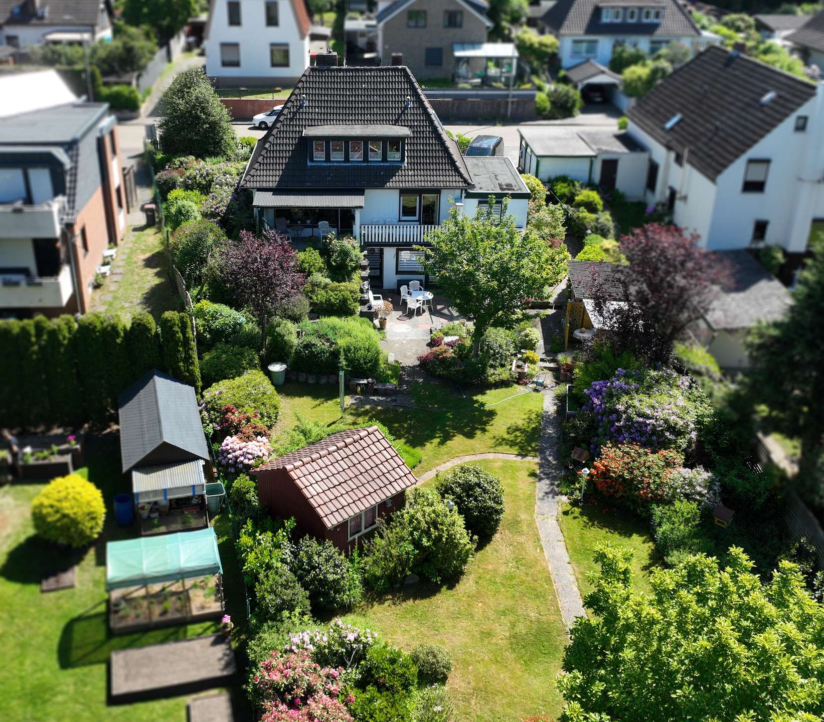 Außenansicht – Courtagefrei! Charmantes Einfamilienhaus auf attraktiven Hanggrundstück mit Carport, Ritterhude