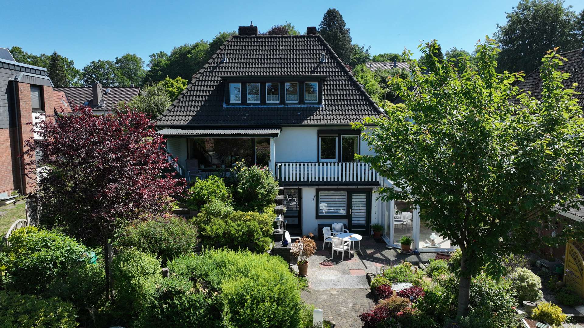 Außenansicht – Courtagefrei! Charmantes Einfamilienhaus auf attraktiven Hanggrundstück mit Carport, Ritterhude